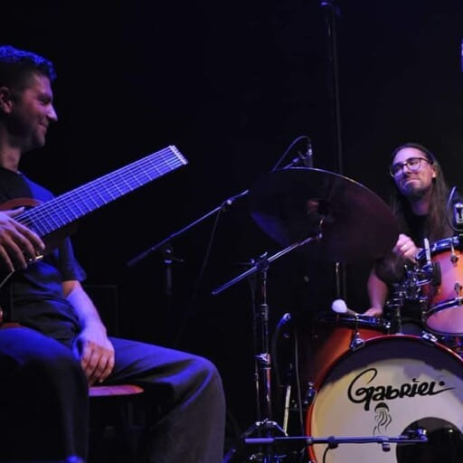 PolyMorΦia Duo for 8 string guitar & drums
